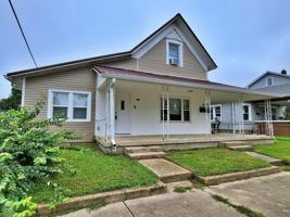 featured image of 332 W 6th St