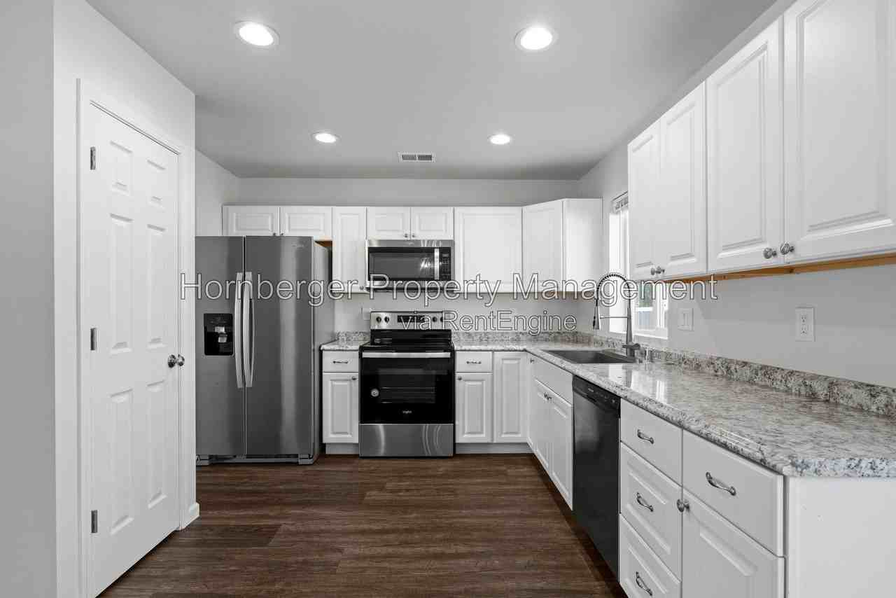 14412 E Heroy Ln - Photo 5 of 26