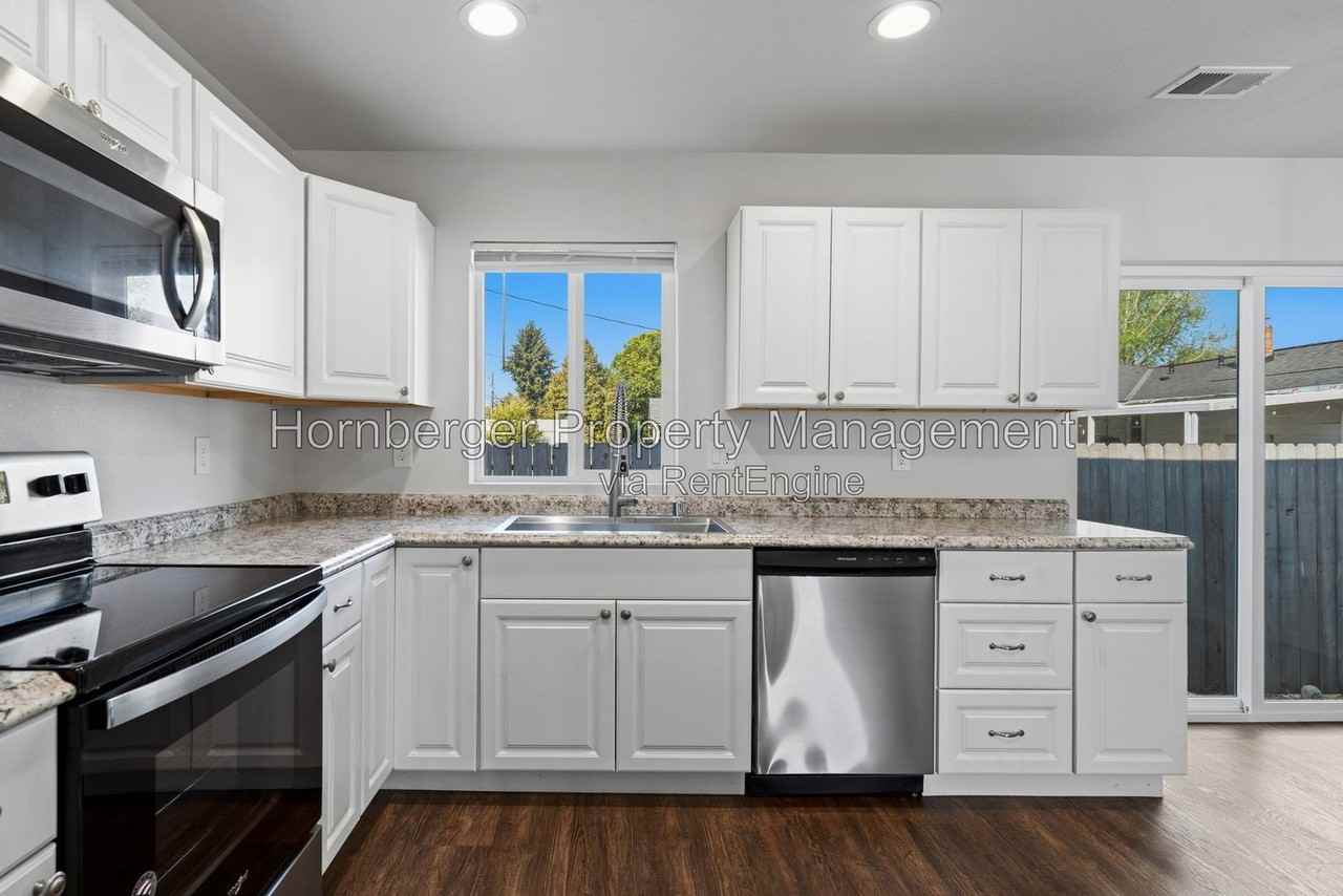 14412 E Heroy Ln - Photo 7 of 26