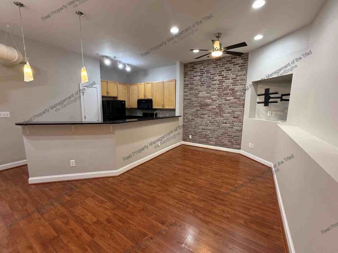 220 W Market St #103 - Photo 3 of 13