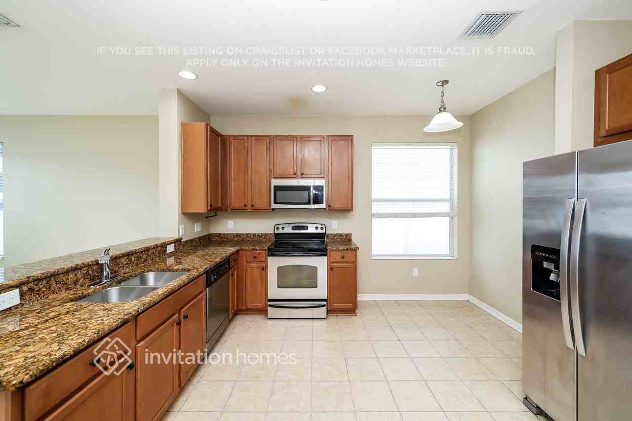 10305 Greystone Ridge Ct - Photo 6 of 17