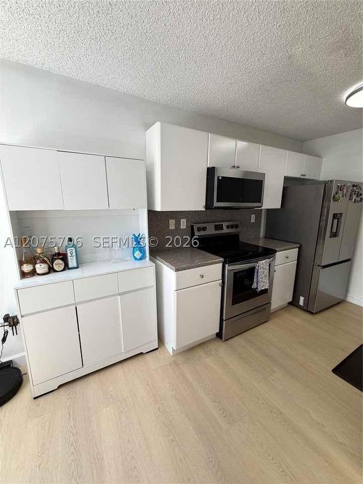 4974 Nw 97th Pl #310 - Photo 6 of 24