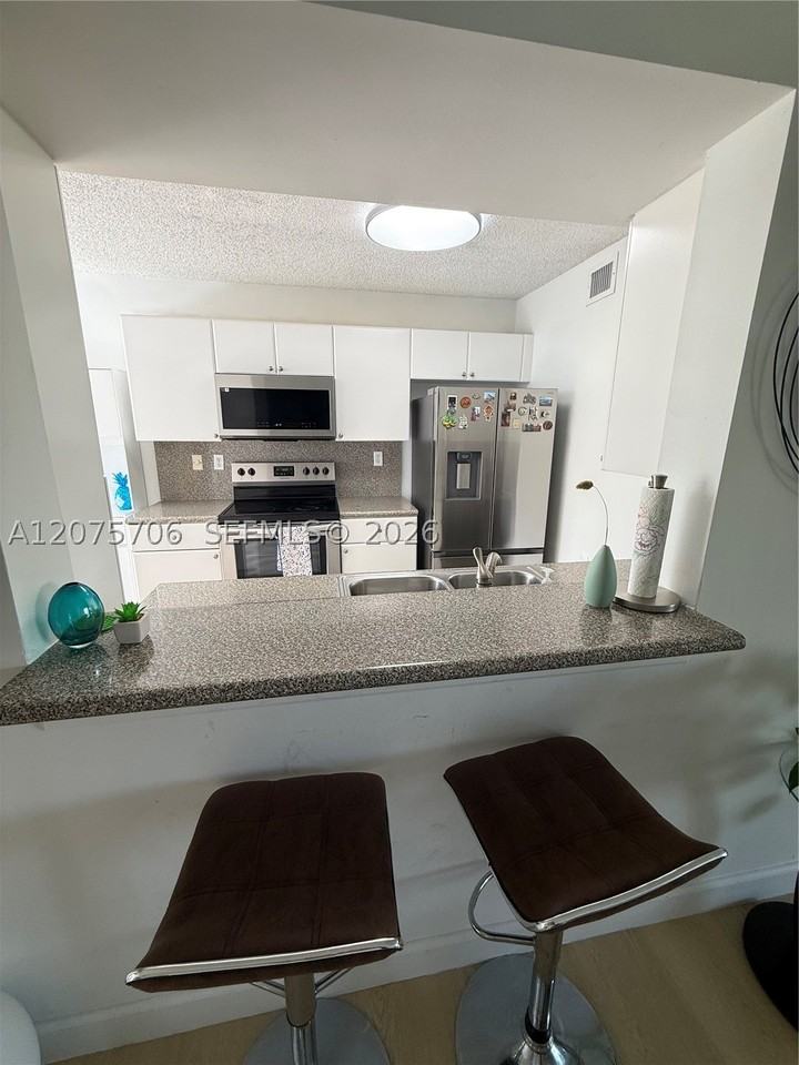 4974 Nw 97th Pl #310 - Photo 7 of 24