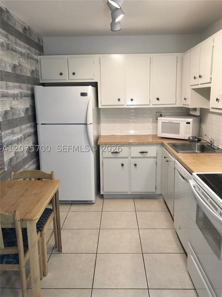 8281 Sw 128th St #104 - Photo 3 of 14