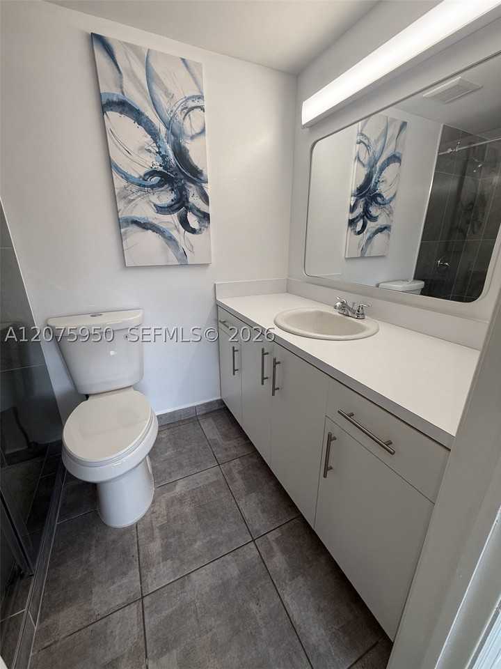 2775 W 61st Pl #202 - Photo 6 of 21