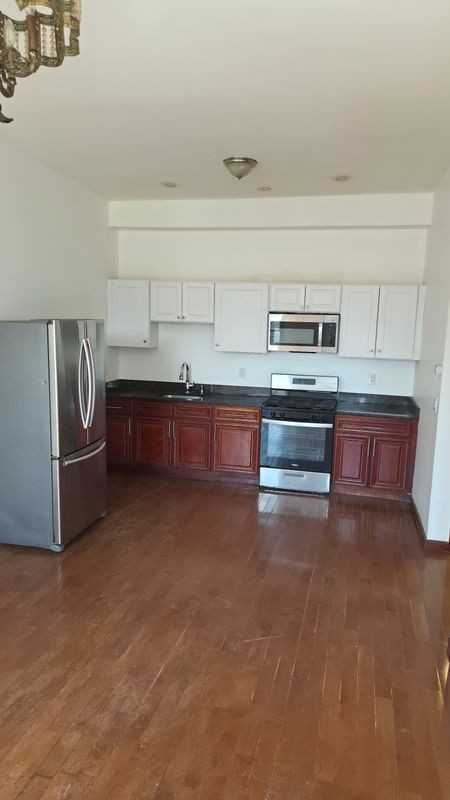 11310 Farmers Blvd ##2r - Photo 4 of 9