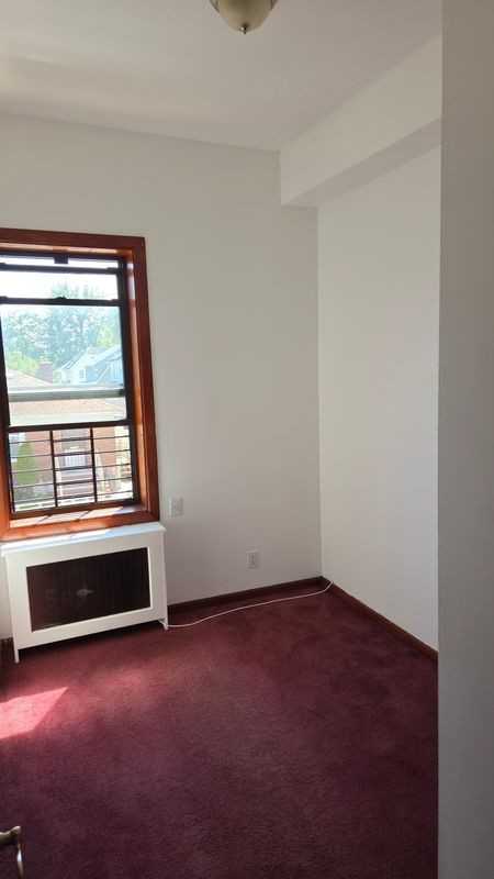 11310 Farmers Blvd ##2r - Photo 7 of 9