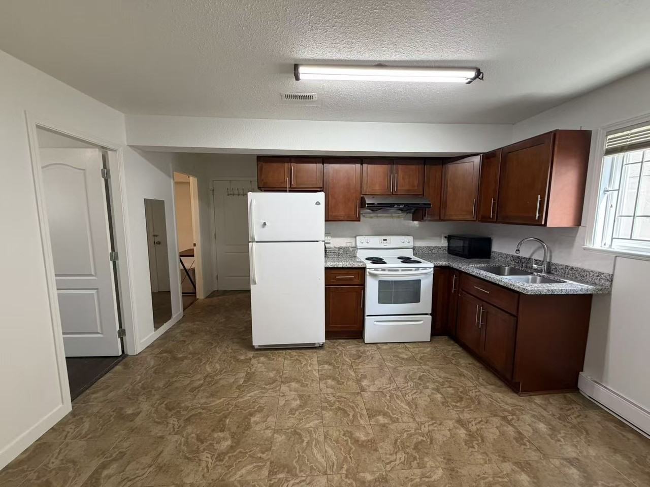 1886 East 52nd Avenue - Photo 4 of 12