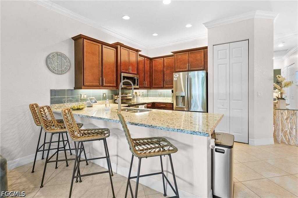 12016 Five Waters Cir - Photo 6 of 49