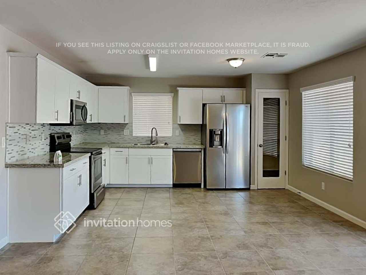 11012 E Aspen Ave - Photo 5 of 18
