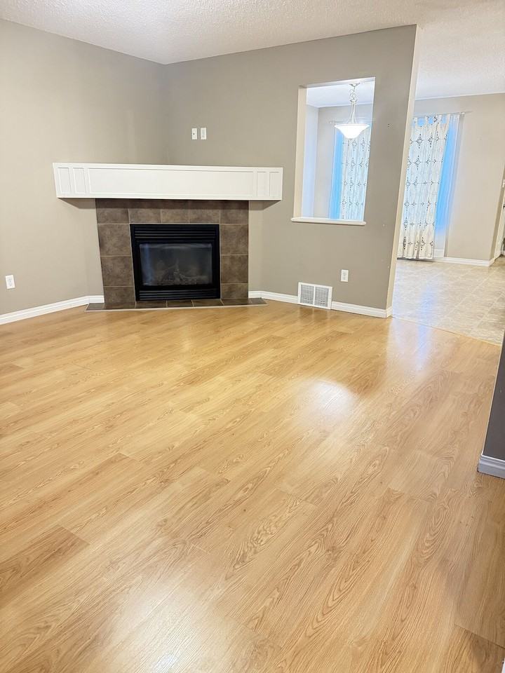 9312 Simpson Dr Nw - Photo 2 of 14