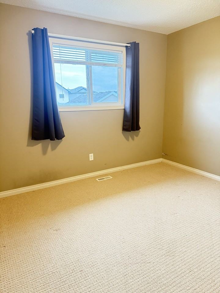 9312 Simpson Dr Nw - Photo 5 of 14