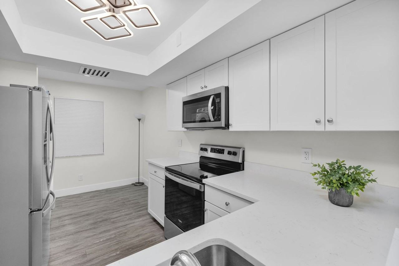 Pierce Beach Premier Apartments at Woodland Condominium - Photo 2 of 50