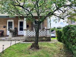 featured image of 117 E Madison St