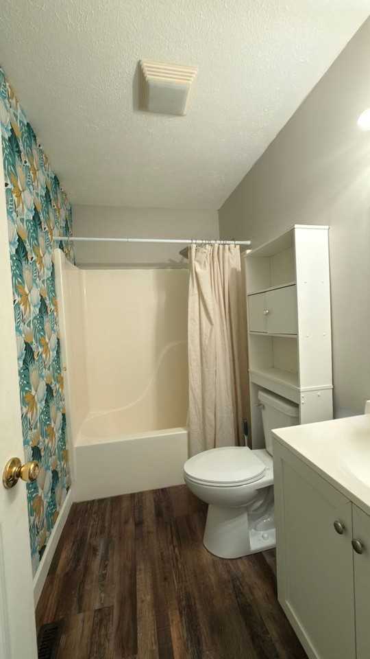 111 E 3rd St - Photo 7 of 8