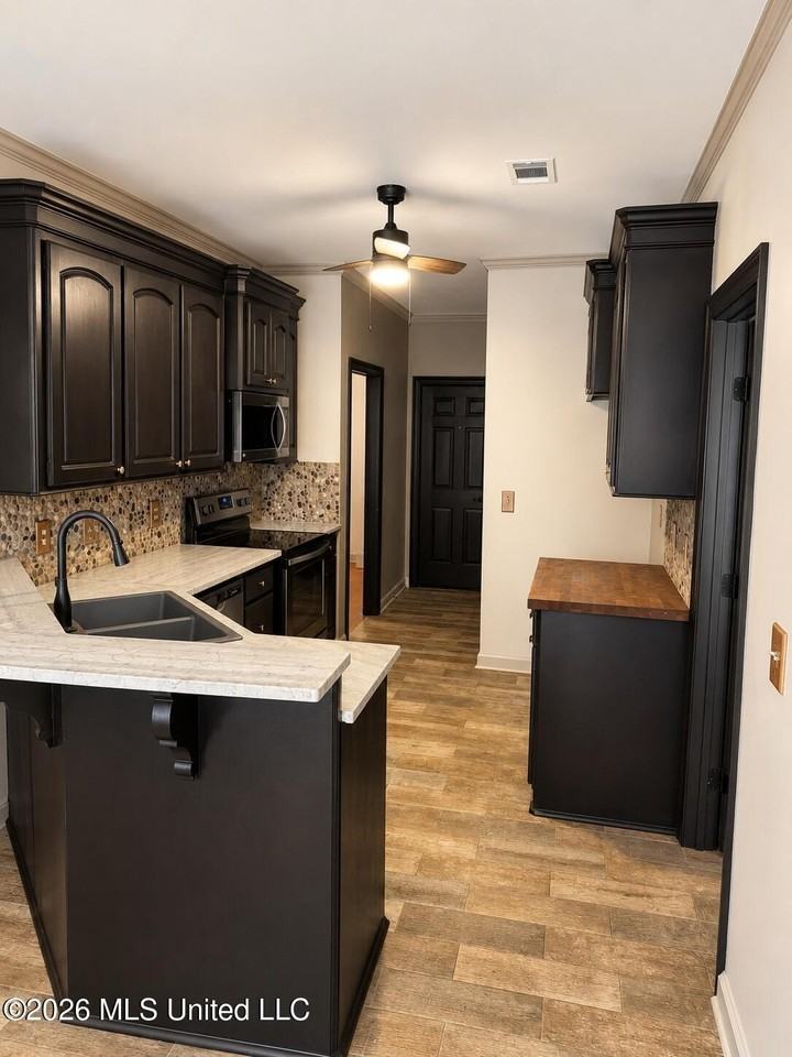 310 G W Bush St - Photo 3 of 4