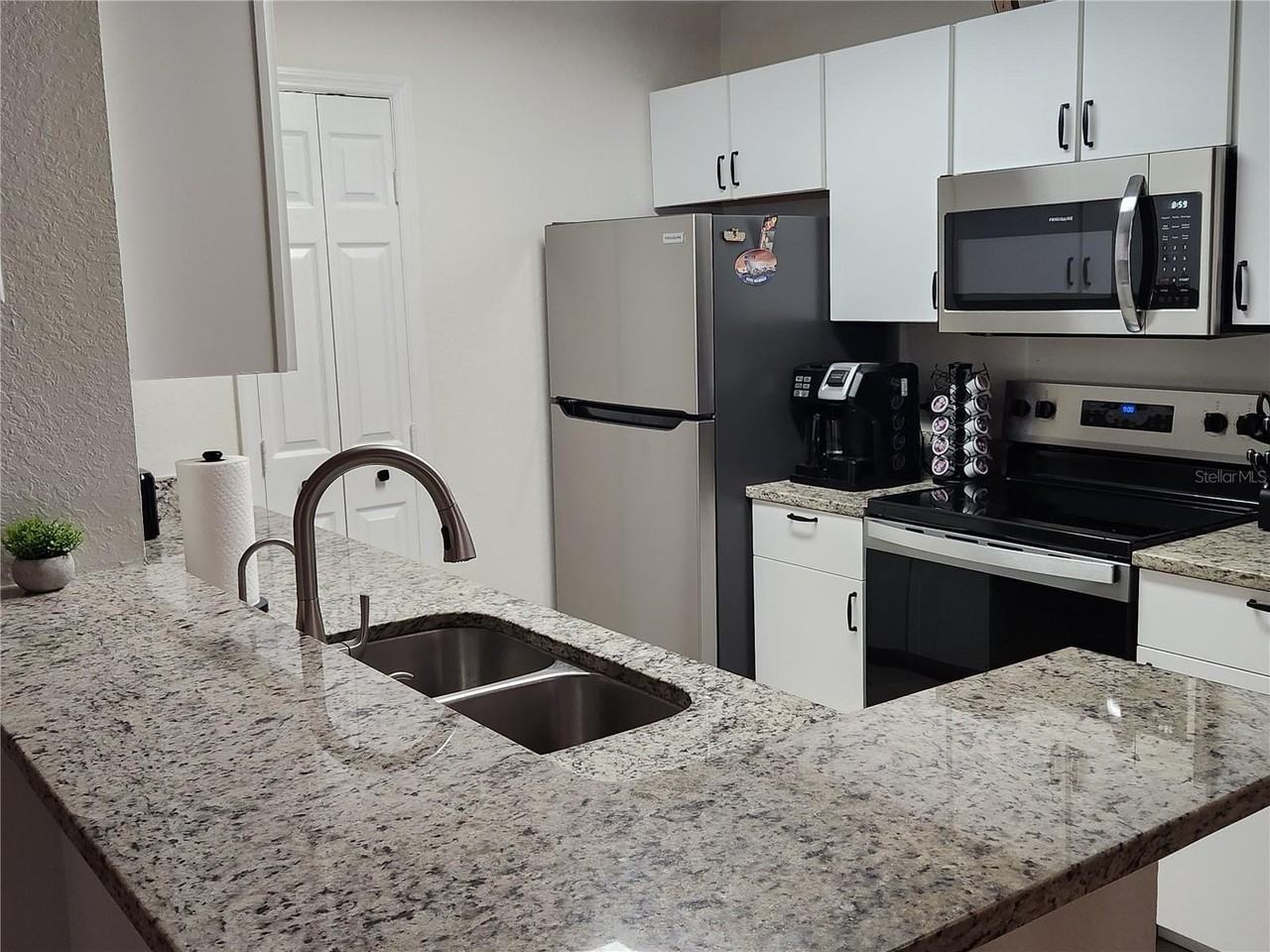 8926 MANOR LOOP Circle #201B - Photo 7 of 32