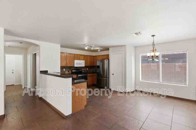 10249 E Calypso Ave - Photo 6 of 30