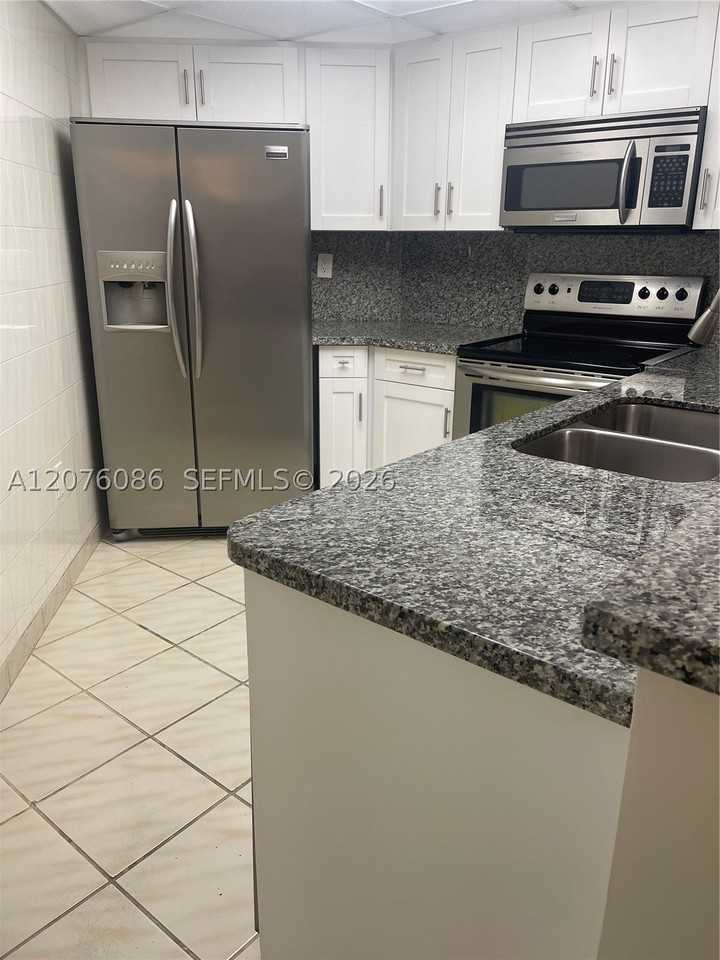 10249 Nw 9th Street Cir #108-8 - Photo 4 of 19