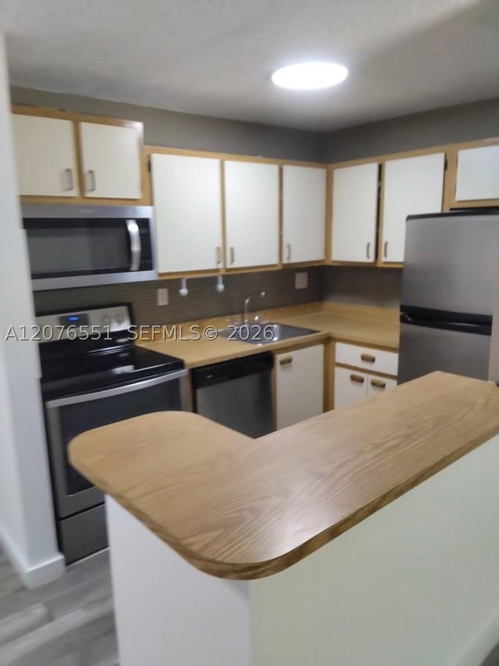 15530 Sw 80th St #C306 - Photo 2 of 14
