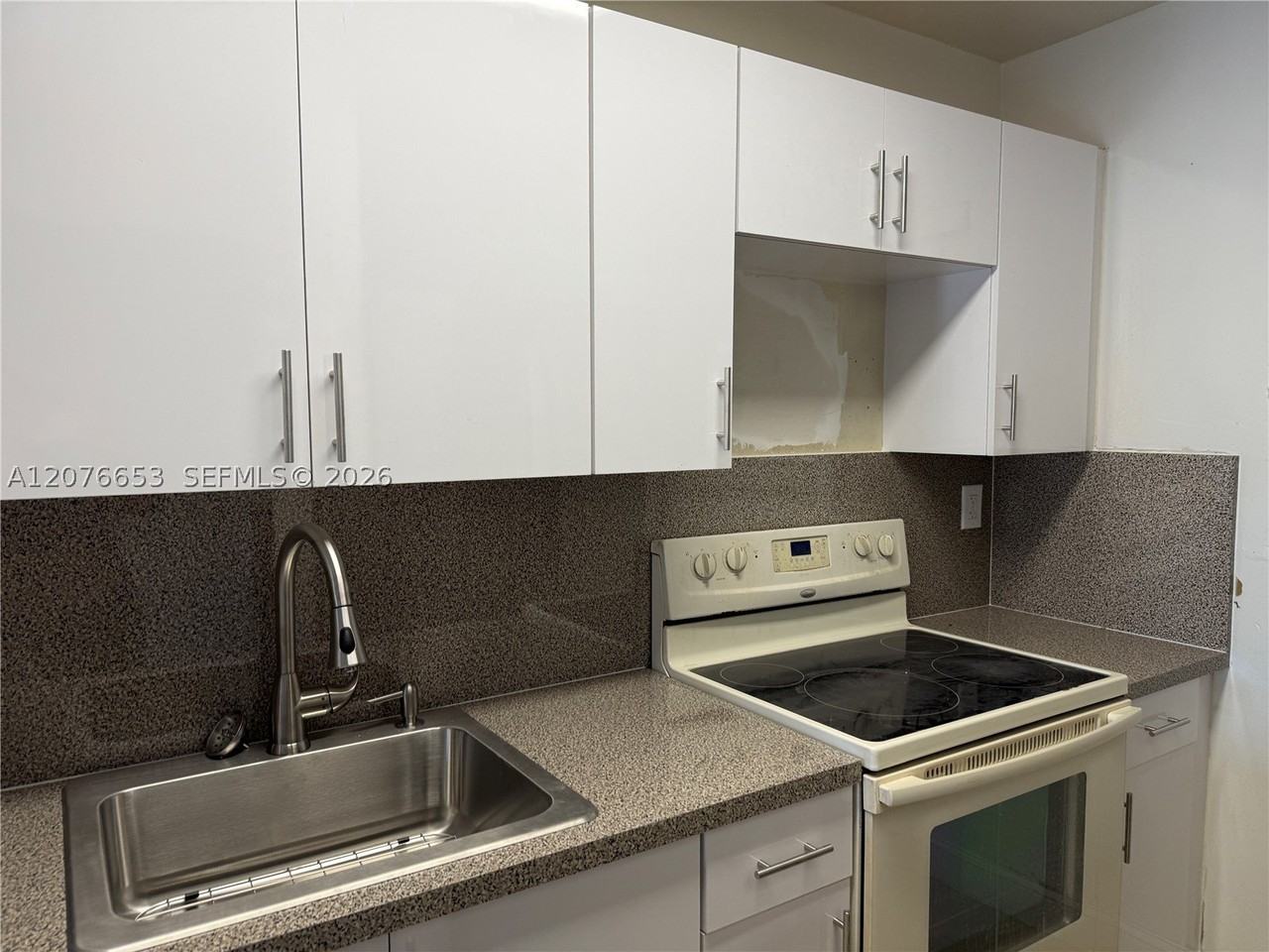 6055 W 19th Ave #311 - Photo 5 of 7