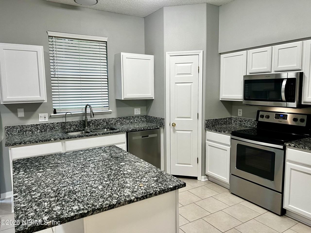 10260 Woodley Creek Rd W - Photo 6 of 24