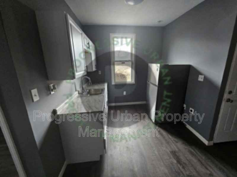 7040 Roy Ave - Photo 5 of 13