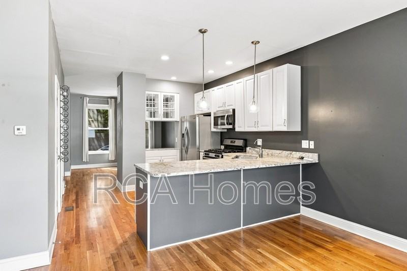 232 E Saint Joseph St - Photo 3 of 13