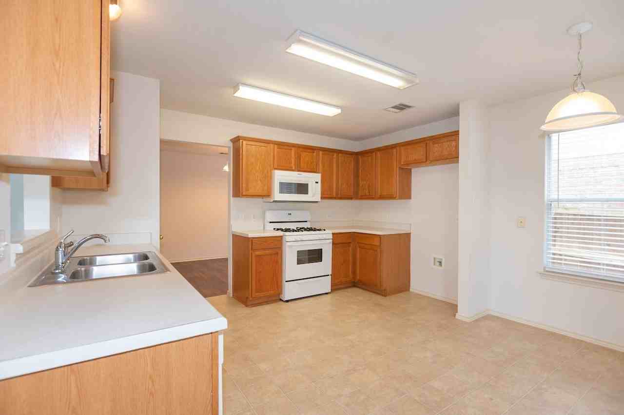 11615 James B Connolly Ln - Photo 4 of 16