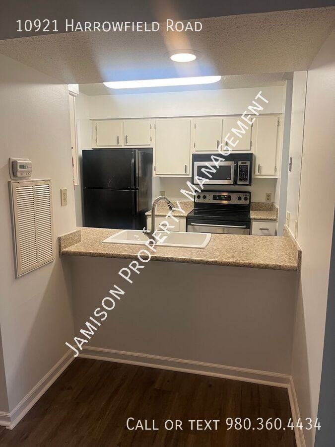 10921 Harrowfield Rd - Photo 5 of 15