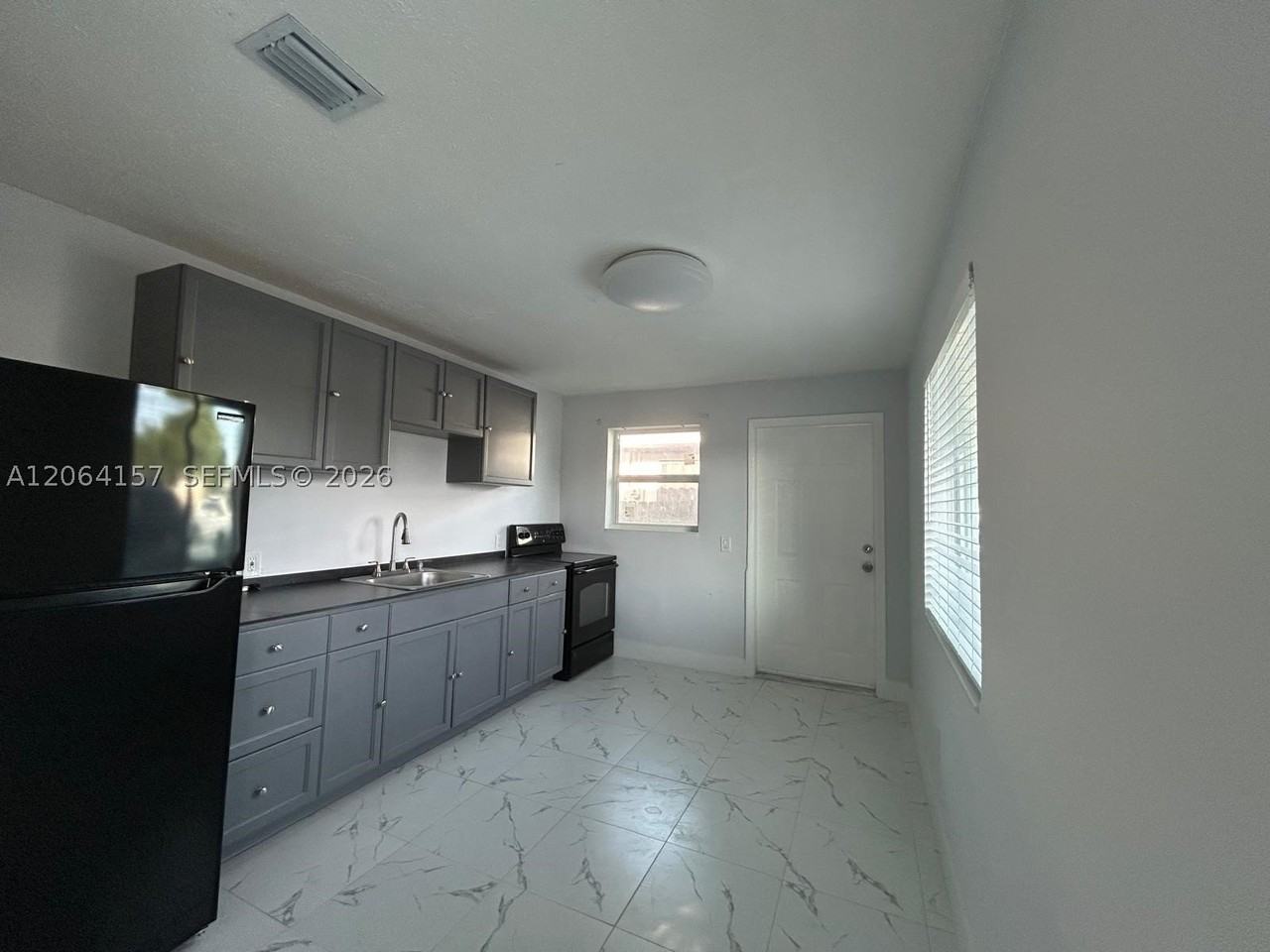 3177 Nw 29th St #A - Photo 3 of 18