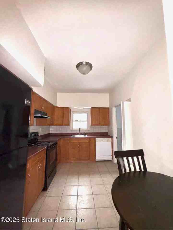 5448 Arthur Kill Rd #2ndFL - Photo 7 of 11