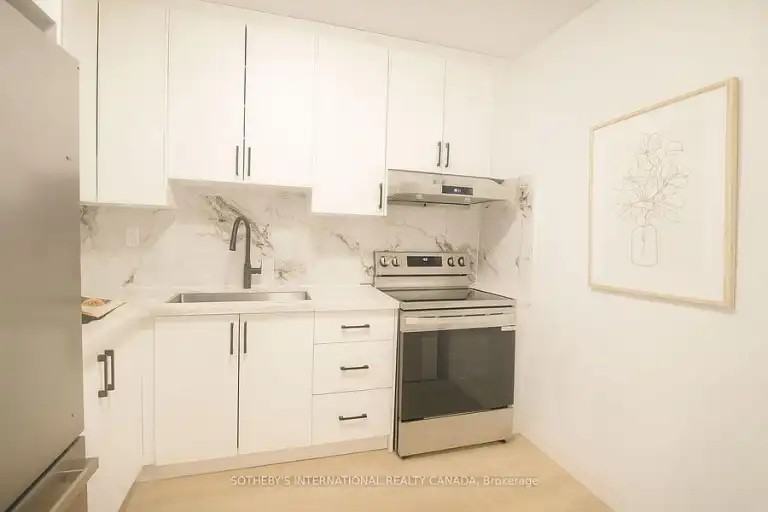 1026 Queen St E - Photo 4 of 10