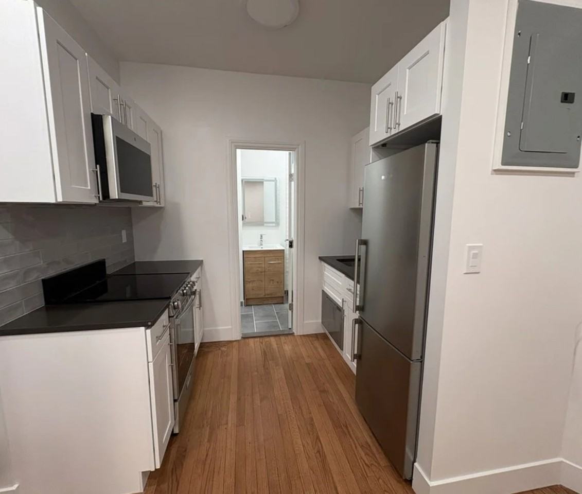 E 96th St - Photo 2 of 7