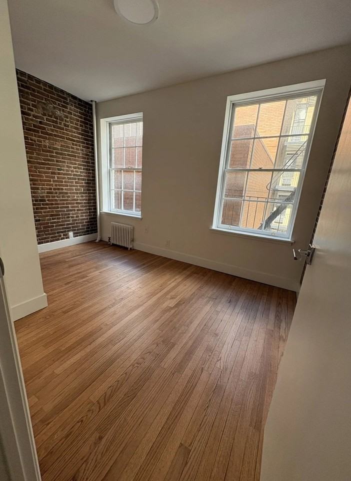 E 96th St - Photo 3 of 7