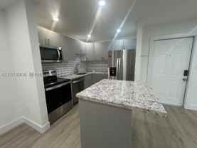 4890 Nw 102nd Ave #101-5 - Photo 1 of 1