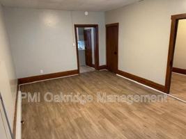 featured image of 104 W 1st St