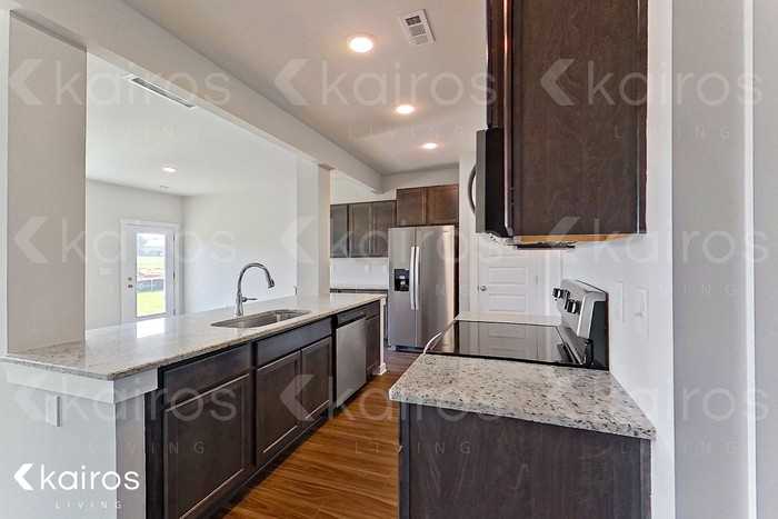 6109 Stonewater Ct Nw - Photo 2 of 19