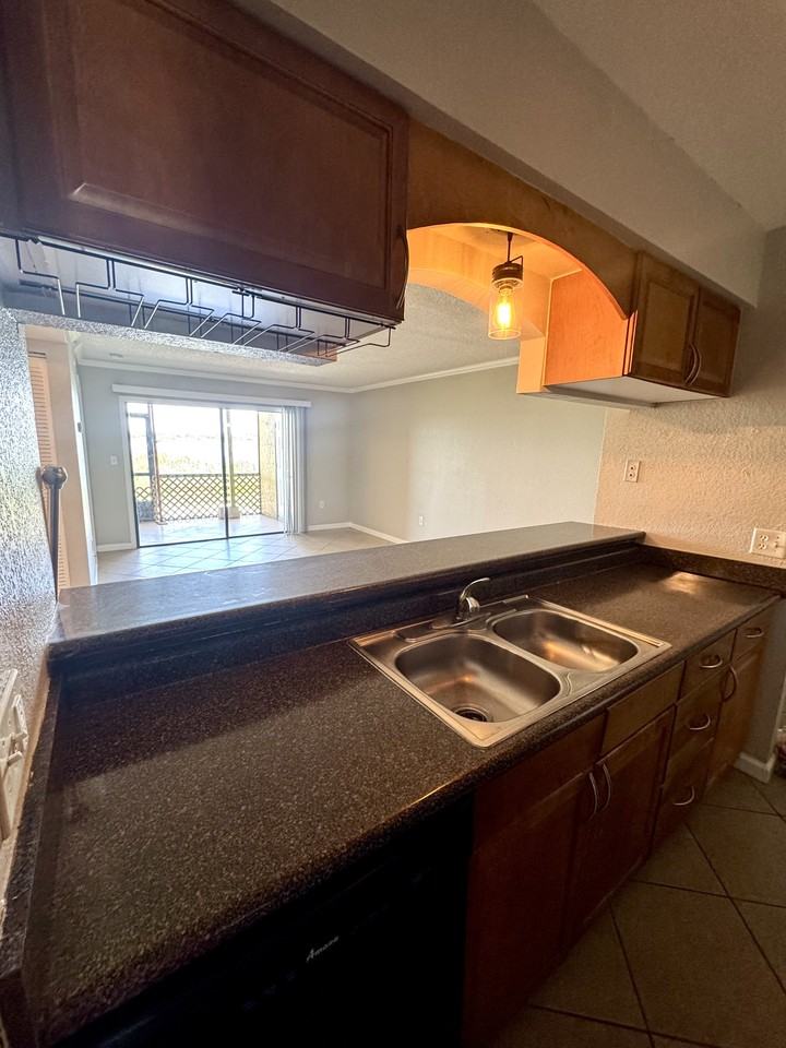 10103 Sailwinds Blvd N #F105 - Photo 3 of 17