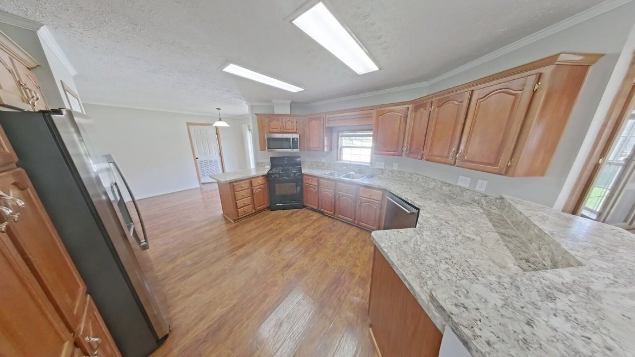 3090 Joslyn Rd - Photo 5 of 15