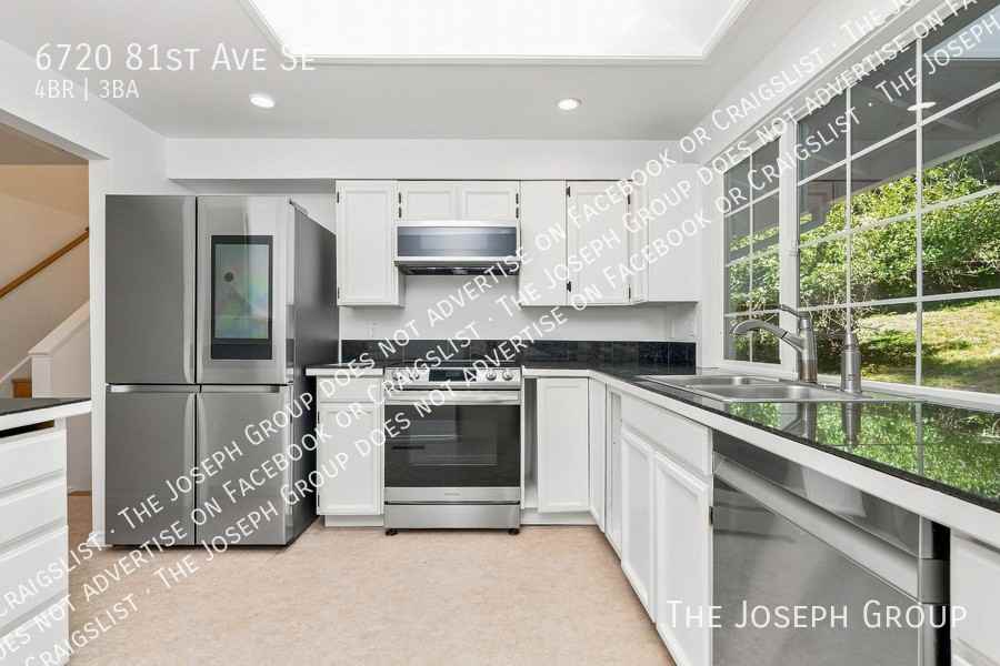 6720 81st Ave Se - Photo 7 of 34