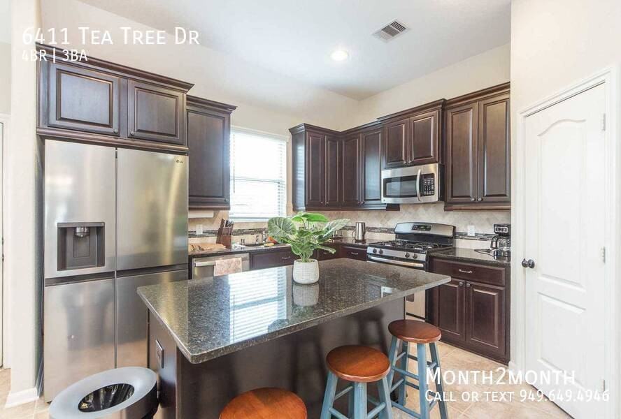 6411 Tea Tree Dr - Photo 3 of 24