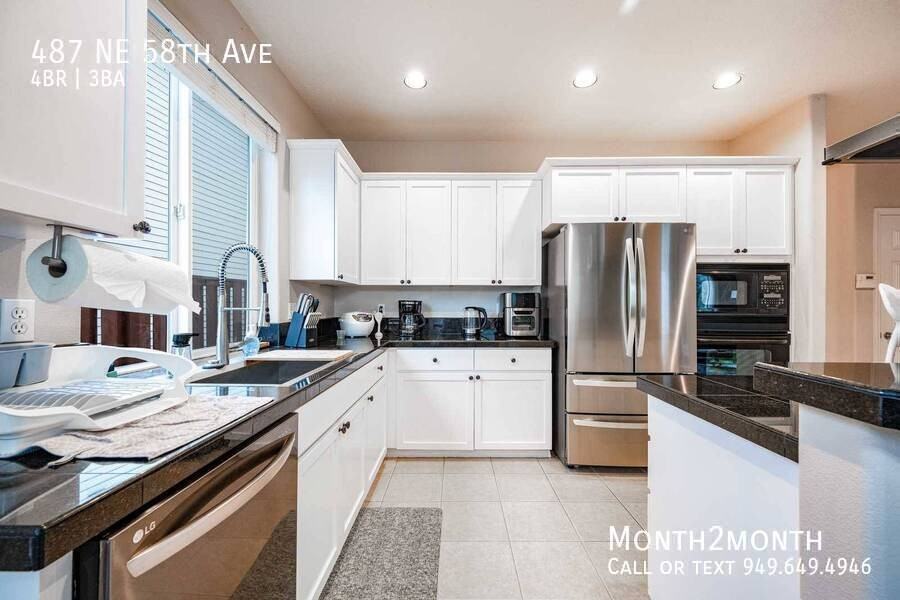 487 Ne 58th Ave - Photo 7 of 26