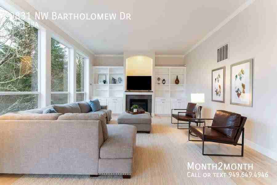 9831 Nw Bartholomew Dr - Photo 3 of 39