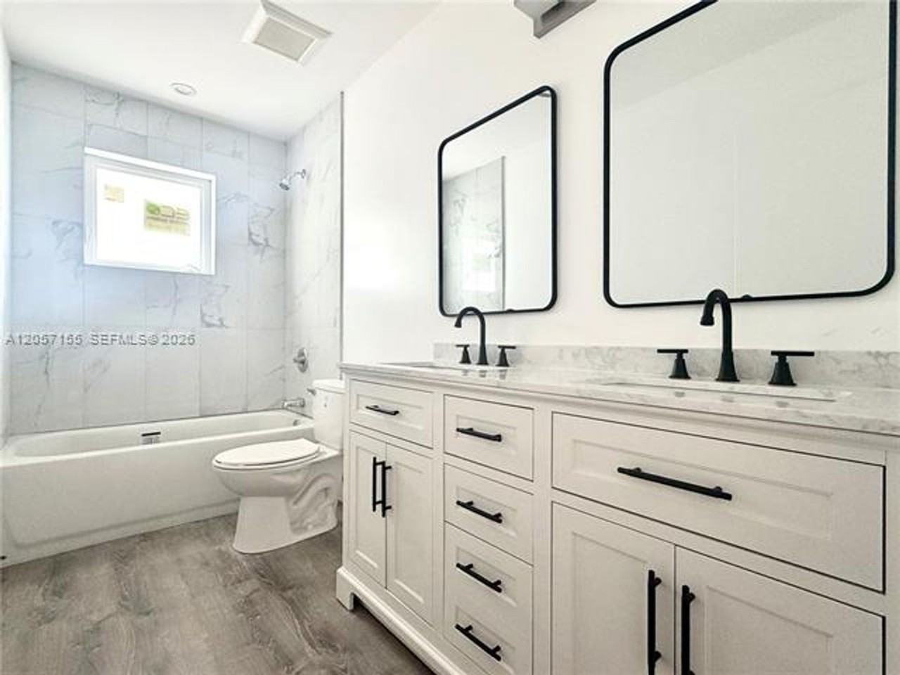 1629 1629 NW 40th St th 1 - Photo 7 of 14