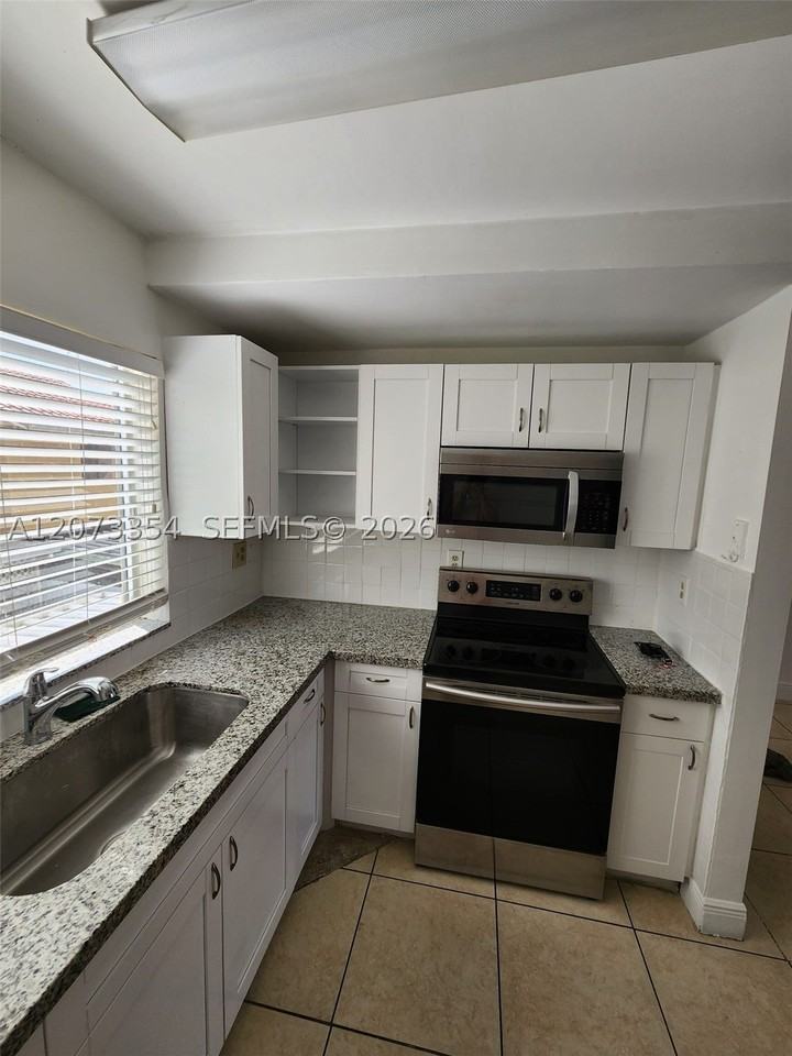 2770 W 61st Pl #202 - Photo 2 of 23