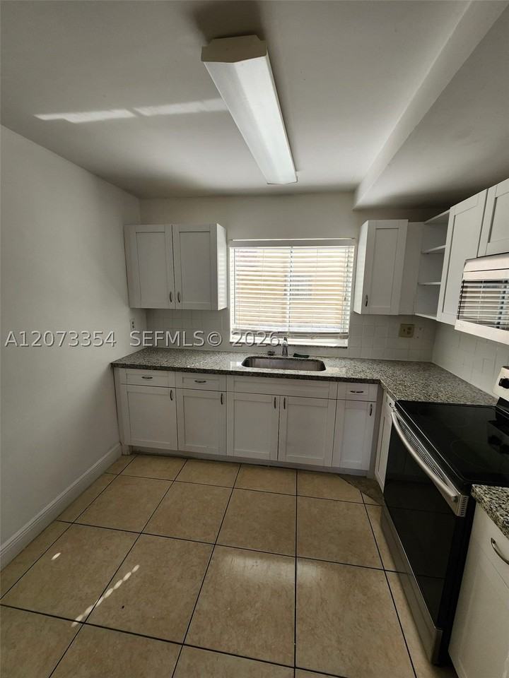 2770 W 61st Pl #202 - Photo 3 of 23