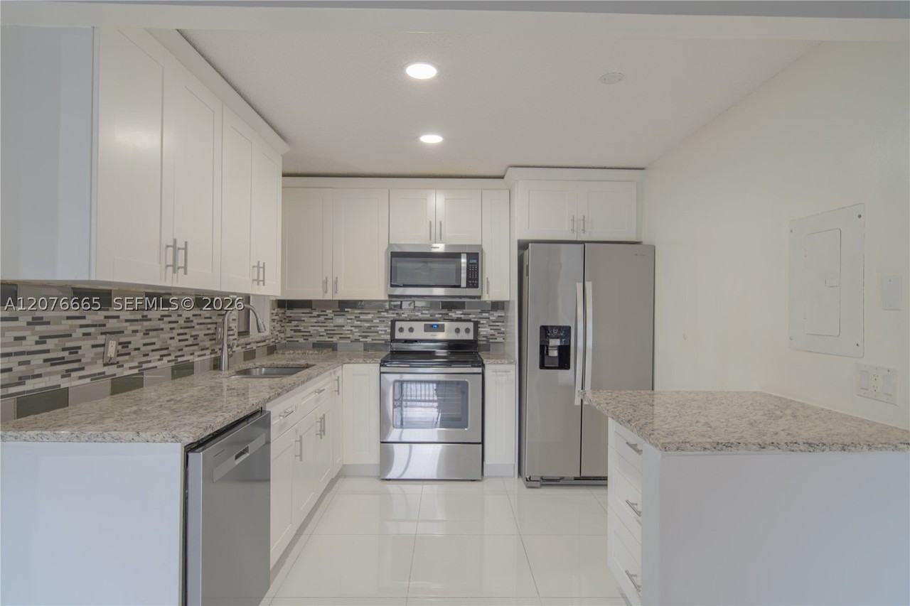 3745 Cocoplum Cir #3561 - Photo 3 of 12