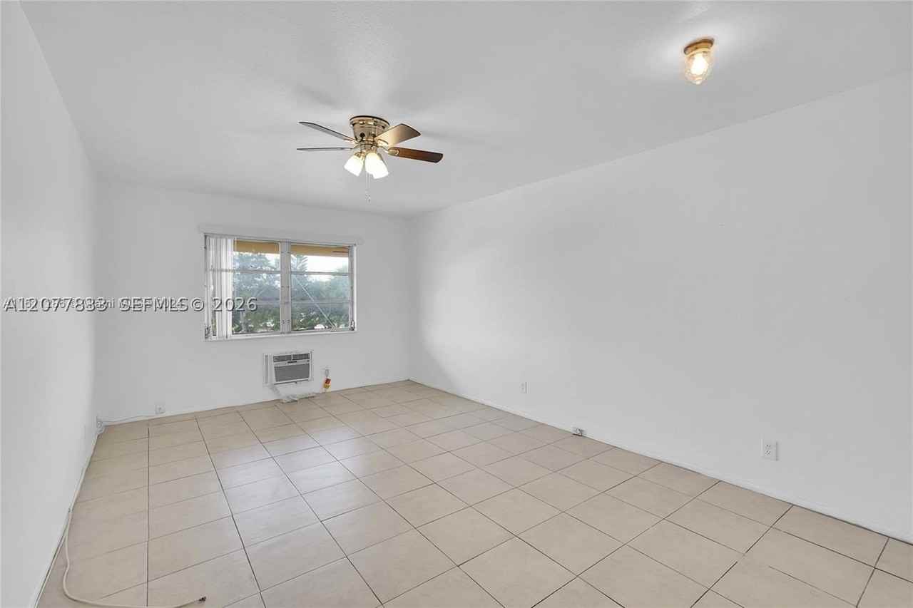 1050 E Sample Rd #309 - Photo 6 of 23