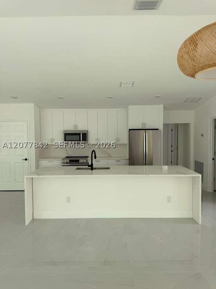 8636 100th Ct - Photo 2 of 19